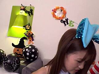 Youthful Asian bunny babe flaunts curvy hips for Halloween fun.