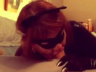 Catgranny casually blows Batman in the comic scene