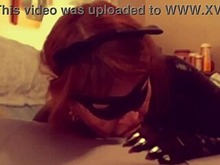 Catgranny casually blows Batman in the comic scene