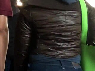 Chubby girl’s brown nylon jacket touched on street