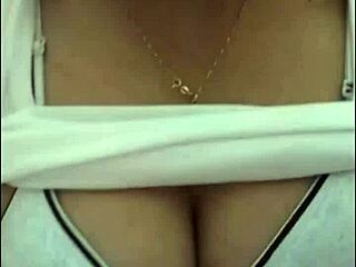 Attractive big tits girl performs live webcam tits show