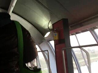 Chubby girl’s brown nylon jacket touched on street