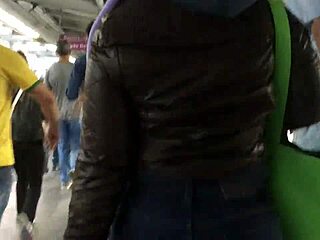 Chubby girl’s brown nylon jacket touched on street