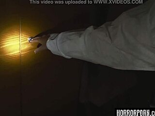 The demon grips the skinny brunette in horror.