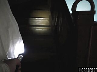 The demon grips the skinny brunette in horror.