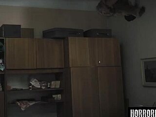 The demon grips the skinny brunette in horror.