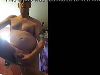 a shy bisexual male, naked in a homemade video, shoots a big cumshot during amateur play