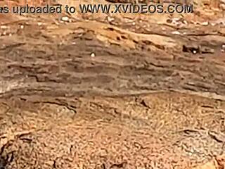 Look at this stunning Brazilian girl getting banged publicly on beach rocks!