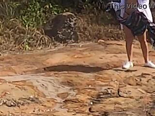 Look at this stunning Brazilian girl getting banged publicly on beach rocks!
