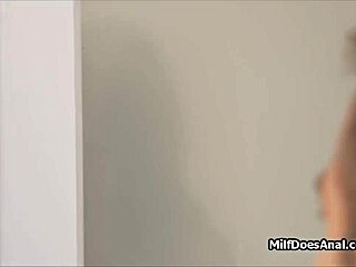 Watch this busty MILF blow dick with a butt plug in?