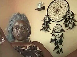 Nae is in bed, playing with her wet pussy.