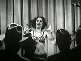 Vintage showgirls perform classic striptease