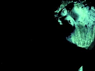 Vintage showgirls perform classic striptease