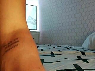 The performer sits firmly on the large member during the performance