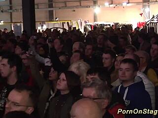 watch these blondes strip and fuck with toys on the public stage