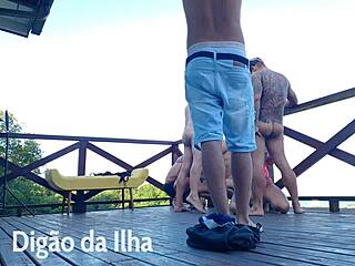 Beautiful redhead with curvy ass on balcony