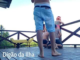 Beautiful redhead with curvy ass on balcony