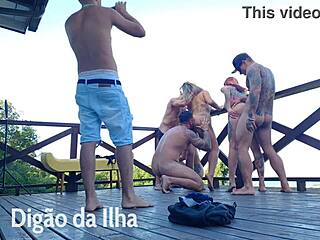 Beautiful redhead with curvy ass on balcony