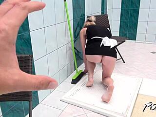 Mature maid in uniform exposes herself