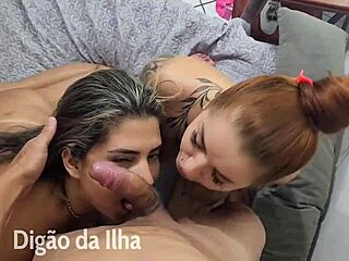 Two beautiful women having fun with a guy in the bedroom