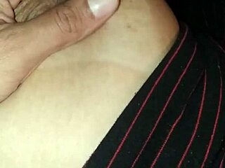 Filming her gorgeous tits while she slept.