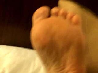 coworker rubs her high arches while masturbating