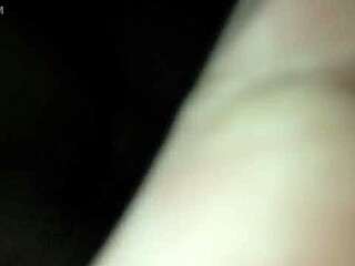 wife sits deliciously on the couch