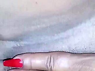 Is the couple squirting together while he trembles from orgasm in interracial voyeur scene?