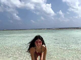 Skinny Beauty Pees on Maldives Beach, Gets Golden Shower on Glasses