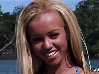 Amateur blonde with big tits and tattoo engages in outdoor threesome with group