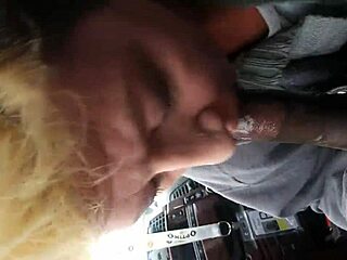 She swallows the black nut with intense passion