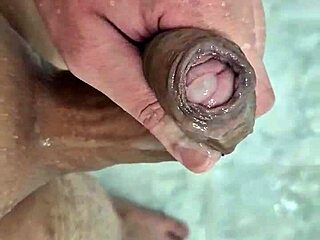 Cute young twink cums deliciously in the shower with neighbors watching