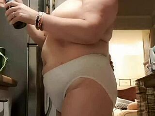 Wife in kitchen wearing big panties. Her first time showing off that BBW body.