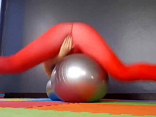 Regina Noir yoga pants a woman in yoga leotards practices yoga in the gym transparent red leotard yoga