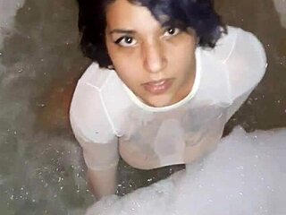 Horny Latina gets very wet using dildo on her ass.