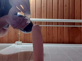 latexi69 rocks latex costume while riding a massive dildo