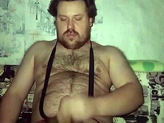 i'm lovin' this russian gay guy masturbatin' his big tattooed cock and shakin' balls
