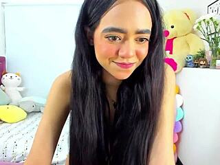 Latina teen 18+ at 19 looks cute with a shy, innocent charm.