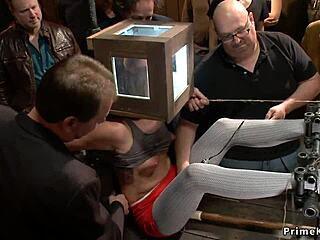 redhead and blonde subs get punished with public anal banging in bizarre group scene