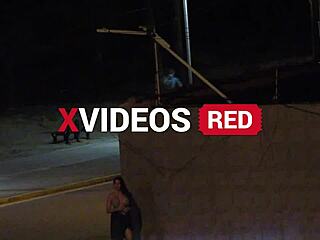 Beach security camera catches couple getting frisky in public spot.