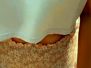 Wifey changes shirt and exposes her tits