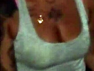 Brazilian milf slut in gloryhole booth