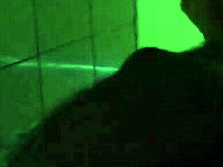 Black woman gently puts the young girl to breastfeed in a tender moment.