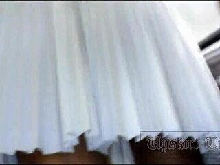 Blonde flashes upskirt under skirt in hidden cam