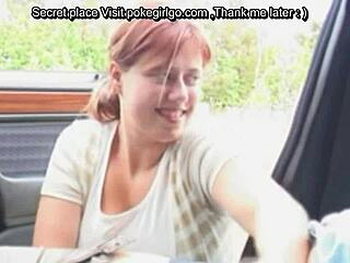 Young redhead BBW girl relaxes in car