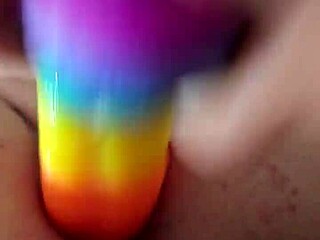Rainbow Dildo Penetrates Anal Creampie