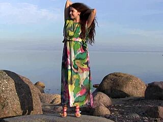 i watch norma a masturbate sensually on the beach with her shaved pussy