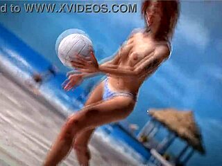 is this petite redhead topless on the beach with a thug?