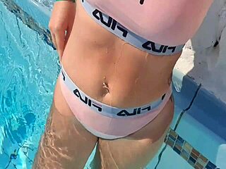 Blonde Amateur Masturbates Wet Pussy in Public Pool