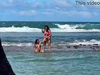 Two beautiful girls enjoy the beach at Enseada dos Corais in Cabo